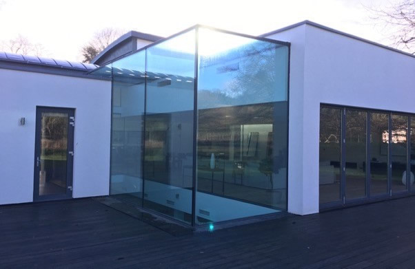 Large glazed structure above the swimming pool